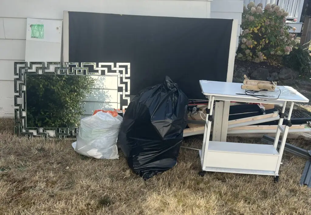 a pile of different old home furniture