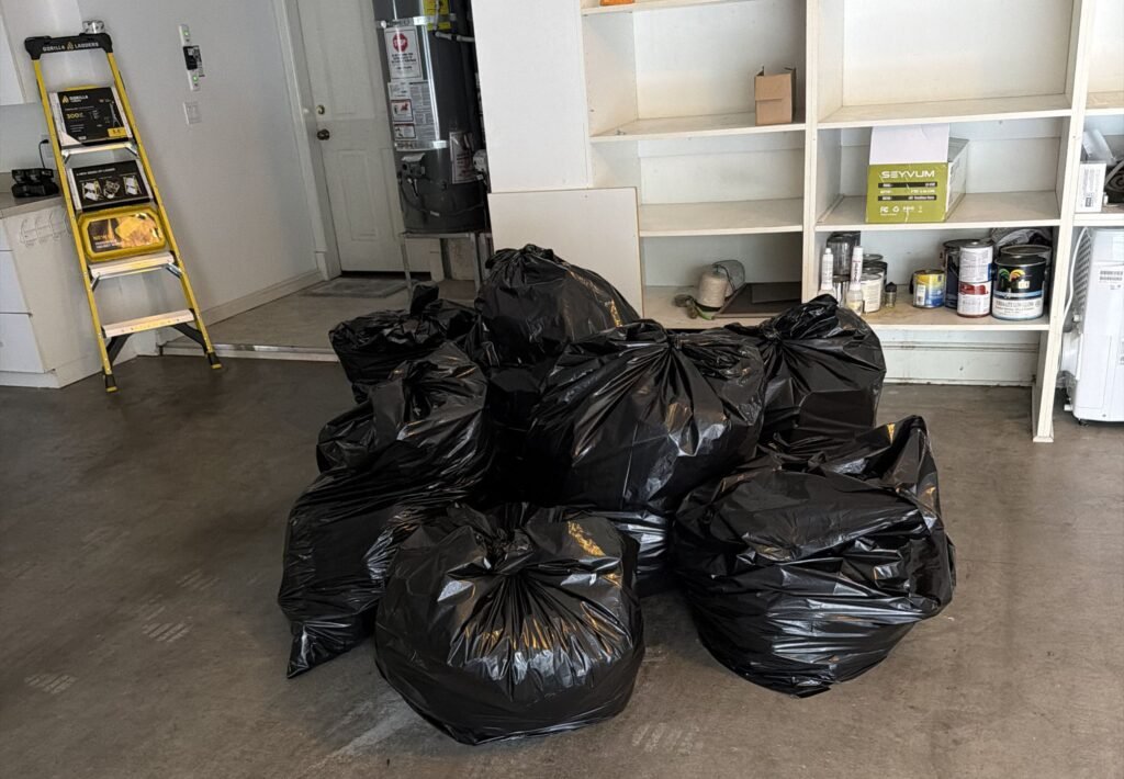 pile of black garbage bags